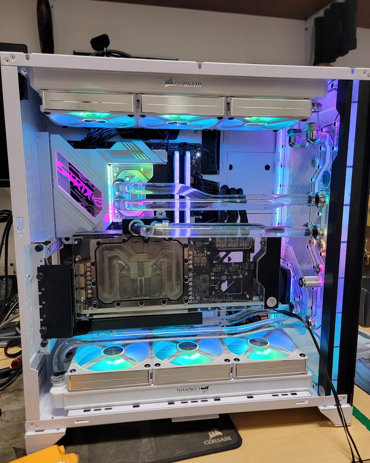 White Corsair build with clear hardline tubing and RGB fans
